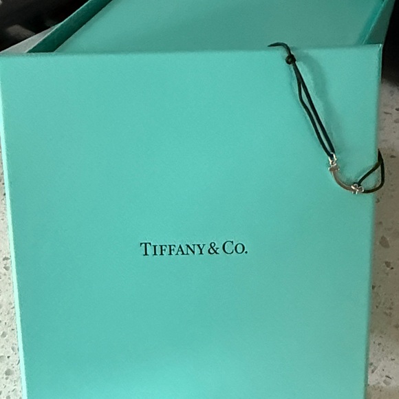 Tiffany & Co. Jewelry - Tiffany & Co. Silver Charm on Black Cord Bracelet